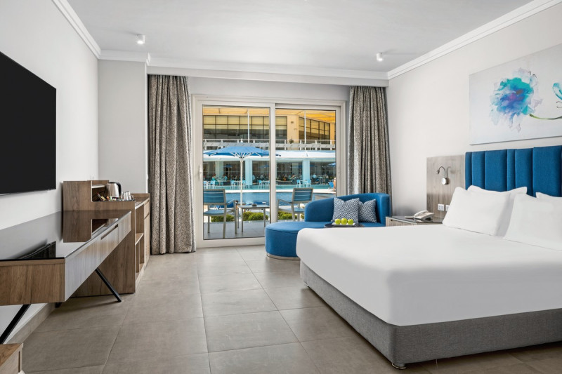 Wohnbeispiel Doppelzimmer Deluxe Poolblick