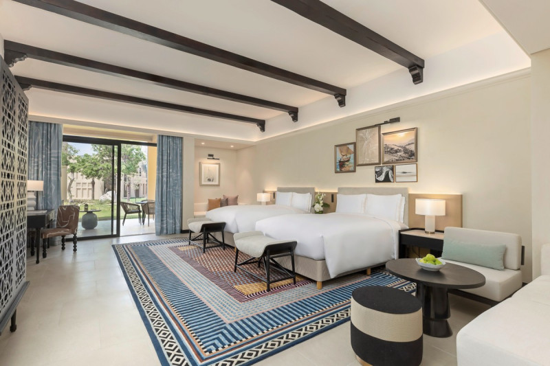 Wohnbeispiel Luxury Two Queens Room with Garden View