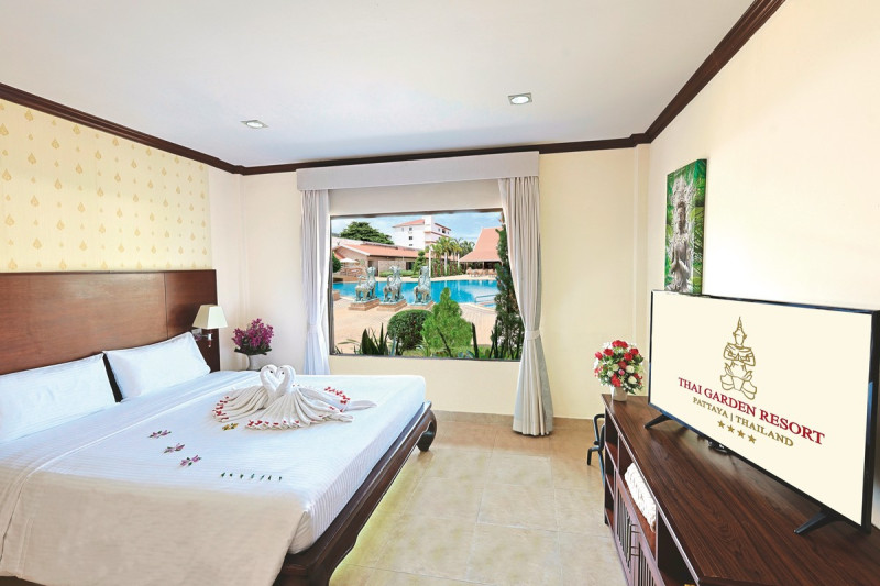 Wohnbeispiel One Bedroom Junior Suite Poolside