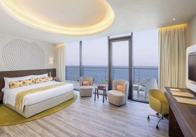 Wohnbeispiel Deluxe One Bedroom Suite Partial Sea View