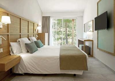 Wohnbeispiel Bungalowzimmer Superior Gartenblick mit Verbindungst&uuml;r