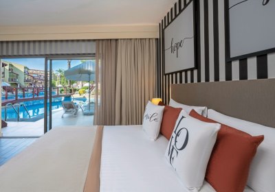 Wohnbeispiel Lake House Familienzimmer Swim Up