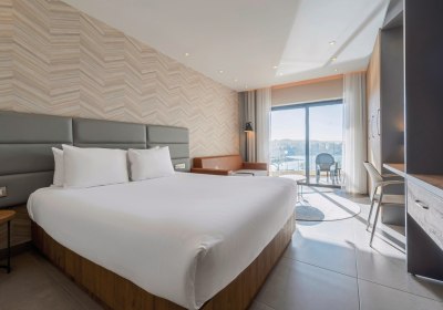 Wohnbeispiel Doppelzimmer Queen Guest Room mit Meerblick