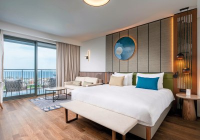 Wohnbeispiel DZ Deluxe 4 Meerblick Community Bereich